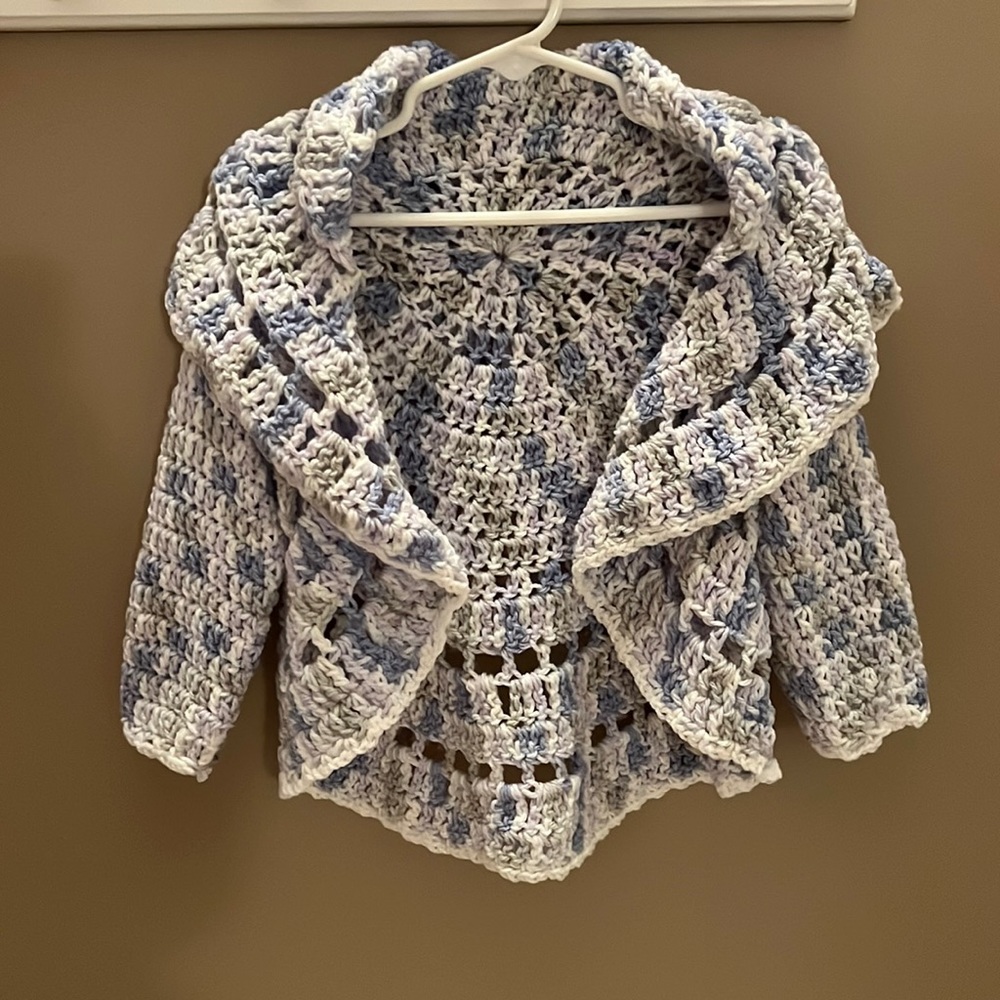 Sassy little shrug. Handmade by Mom. Fits most children aged 7-10 years.